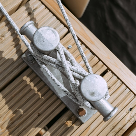 Close-up of rope and metal hook.